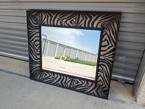 lot 27 image: 27. 34 x 40 Zebra Print Framed Mirror
