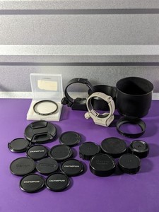 lot 49 image: Lot of Lens Caps, Hood, Filters Bundle