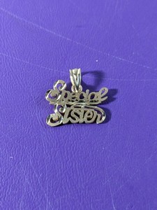 lot 70 image: 14K Special Sister Necklace Charm - 0.9grams