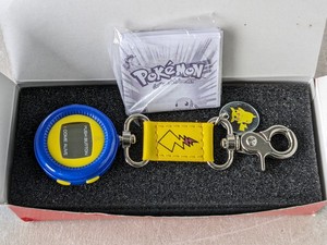 lot 146 image: 1998 Nintendo Pokemon Pikachu Eletronic Virtual Talking Watch Pet Game Keychain