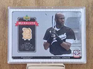 lot 136 image: Michael Jordan - 2001 Upper Deck Minor League baseball card - piece of Game-used bat card - #MJ-B6