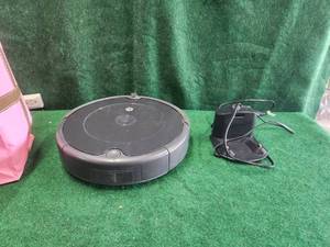 lot 79 image: I-robot vacuum and charging station