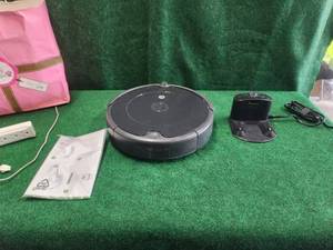 lot 111 image: I-robot vacuum and charging station