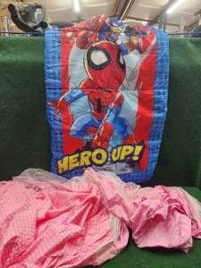 lot 205 image: Superhero childs sleeping bag and pink childs bed canopy