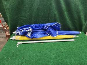 lot 207 image: Blue & Yellow jumbo beach umbrellas
