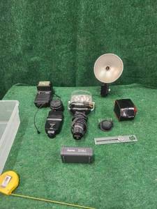 lot 106 image: Selection of camera accessories