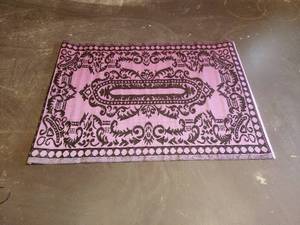 lot 328 image: Black & Pink indoor & outdoor plastic mats-rugs - 48 x 68 - bid x 10