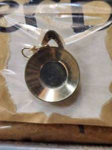 lot 128 image: Generous selection of metal pendants and charms for jewelry and craft making