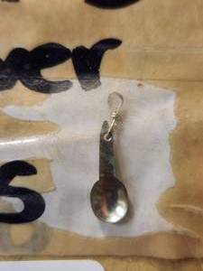lot 137 image: Generous selection of metal pendants and charms for jewelry and craft making