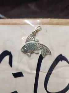 lot 157 image: Generous selection of metal pendants and charms for jewelry and craft making