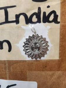 lot 165 image: Generous selection of metal pendants and charms for jewelry and craft making