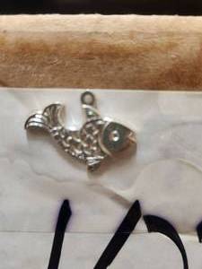 lot 176 image: Generous selection of metal pendants and charms for jewelry and craft making