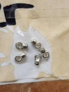 lot 208 image: Generous selection of metal pendants and charms for jewelry and craft making