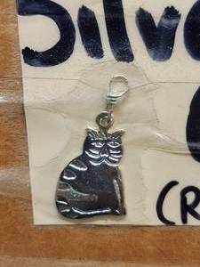 lot 215 image: Generous selection of metal pendants and charms for jewelry and craft making