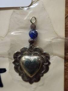 lot 222 image: Generous selection of metal pendants and charms for jewelry and craft making
