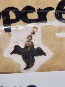lot 243 image: Generous selection of metal pendants and charms for jewelry and craft making