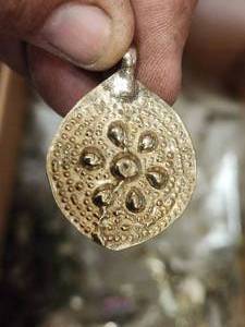 lot 283 image: Generous selection of metal pendants and charms for jewelry and craft making