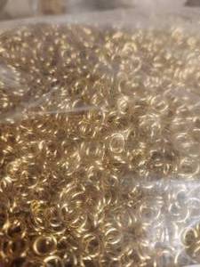 lot 415 image: Generous selection of gold circular links for jewelry making - 3 bags
