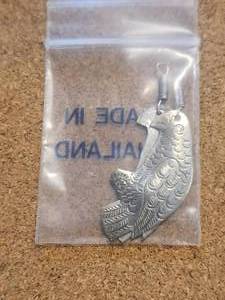 lot 425 image: Generous selection of metal pendants and charms for jewelry and craft making