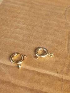 lot 472 image: Generous selection of gold circular clasp for jewelry making - 3 bags