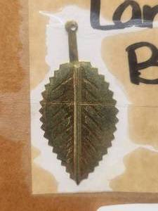 lot 492 image: Generous selection of metal pendants and charms for jewelry and craft making