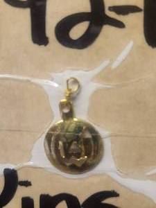 lot 494 image: Generous selection of metal pendants and charms for jewelry and craft making