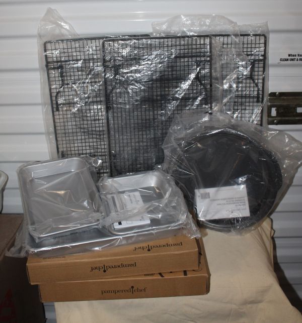 lot 2 image: Unused Pampered Chef Bakeware 3 Stackable Cooling Racks, Modular Cake Pan Set and Round Cake Pan Set - All Never Used