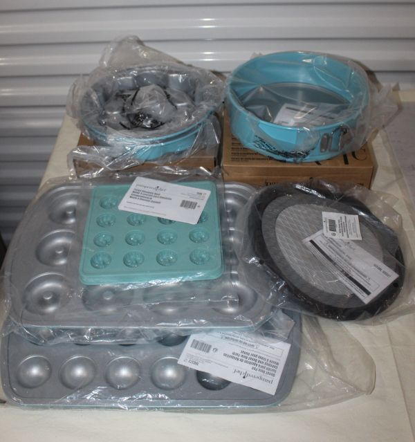 lot 7 image: Unused Pampered Chef Bakeware and Molds 9 Springform Cake Pan, Secret Center Cake Pan Set, Chololate Fluted Molds, Donut Pan. Donut Hole Pan and Nesting Silicone Trivets. All Never Used