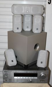 lot 1 image: Yamaha Natural Sound AV Receiver Model # HTR 5740 and Yamaha Suround Sound Speaker Set Model # YST SW010