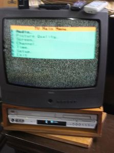 lot 32 image: Vintage RCA Television and JCV DVD and VCR Player and Panasonic Atena