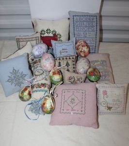 lot 42 image: Vintage Beautiful Cross Stitched Home Dcor Pillows, and Decroative Eggs