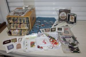 lot 91 image: DMC Thread Cabinet with Thread, Patterns and completed or partially completed Cross Stitch