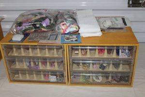 lot 136 image: Two DCM Embroidery Floss Storage and Organization Boxes(Can be used to store and organize many other Items) as well as extra Floss, Design Patterns and other Items