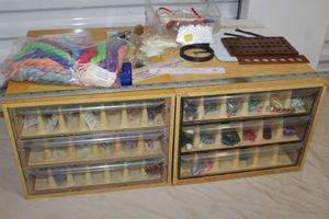 lot 144 image: Set of Two DCM Storage and Organization Boxes for Embroidery Floss (or for many other organizational uses) and an additional amount of Floss and Embroidery Tools and Supplies