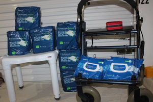 lot 157 image: Variety of Durable Health equipment and Supplies, Bathstool, Walker, Bed Pads and Wipes