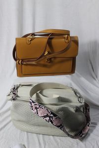 lot 200 image: Two Boutique Purses Never Used