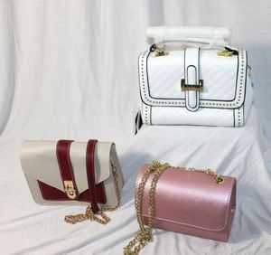 lot 206 image: Three Boutique Purses, New
