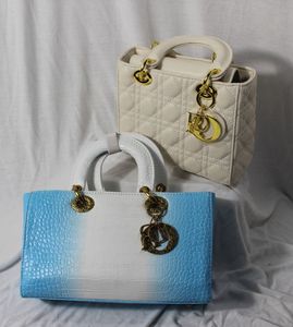 lot 207 image: Two Boutique Purses, New