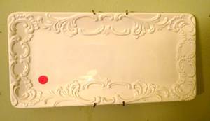 lot 12 image: PLATE STAMPED MADE IN ITALY WITH WALL HANGER - LOOK AT THE DETAIL ON THIS ONE