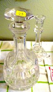 lot 23 image: LEADED CRYSTAL DECANTER AND CANDLE STICK - CHECK THE COMPS ON THE DECANTER