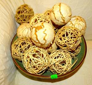 lot 37 image: BOWL FULL OF DECORATIVE WICKER AND FEATHER BALLS