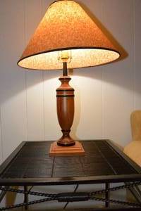 lot 213 image: TABLETOP LAMP WIRTH WOOD BASE AND PRETTY SHADE