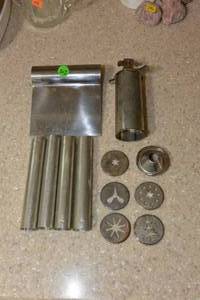 lot 302 image: VINTAGE COOKIE PRESS WITH ATTCHMENTS AND A SET OF CANNOLI ROLLERS WITH CUTTER