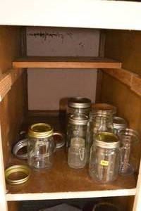 lot 354 image: LOT OF MASON JARS AND LIDS AS SHOWN