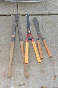 lot 424 image: LOT OF WOOD HANDLED LANDSCAPING TOOLS