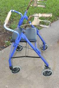 lot 432 image: ROLLING  FOLDING WALKER $$