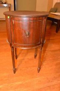 lot 36 image: $$ VINTAGE MOHOGANY ROUND SIDE TABLE WITH DOOR - LOOK AT THE HARDWARE
