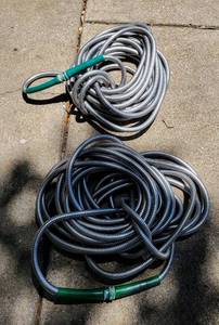 lot 445 image: 2 METAL GARDEN HOSES