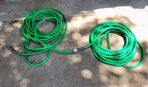 lot 446 image: 2 GREEN GARDEN HOSES