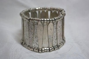 lot 1 image: Galvanized pewter Phillipe Audibert style stretch bracelet with coffin shape links. Heavy. 1.75W